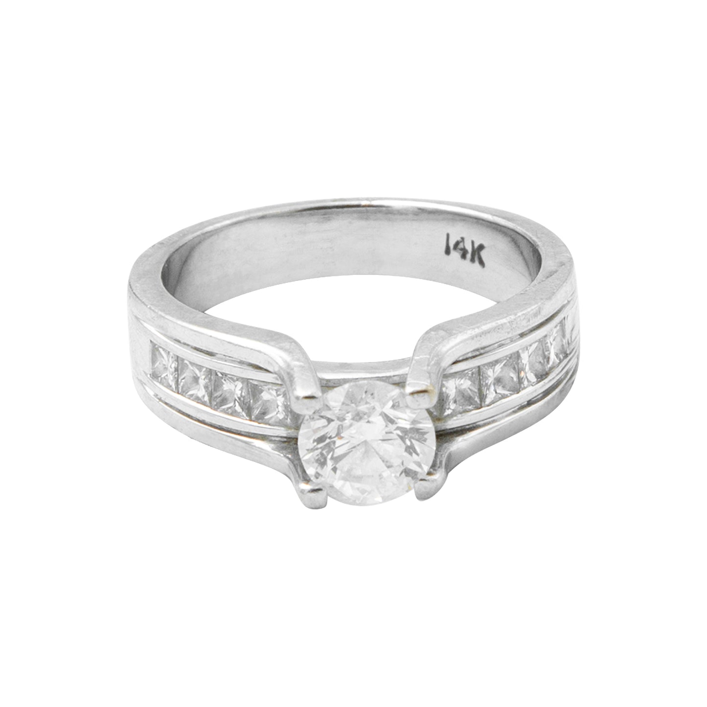 Anillo solitario en oro blanco de 14k con diamantes