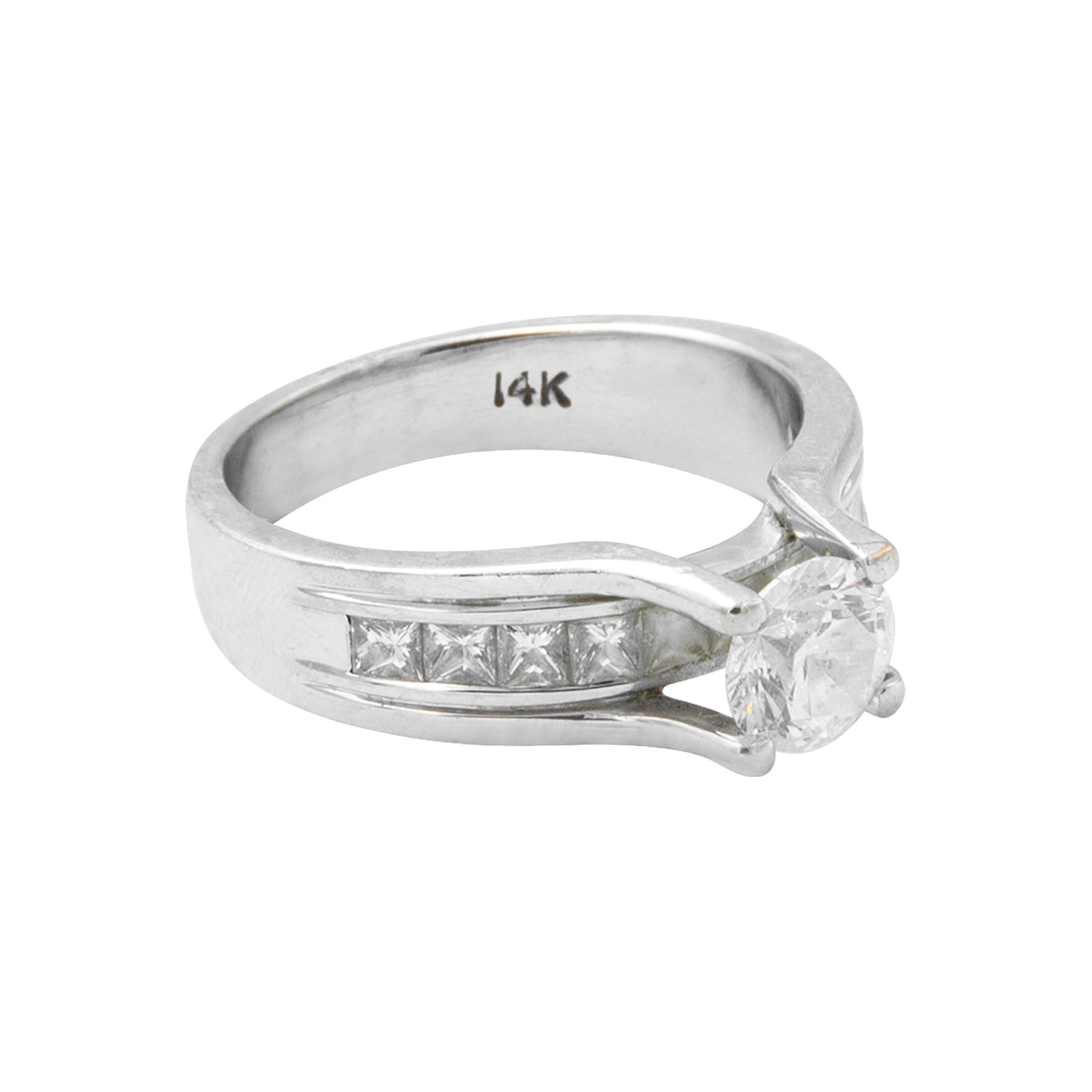 Anillo solitario en oro blanco de 14k con diamantes