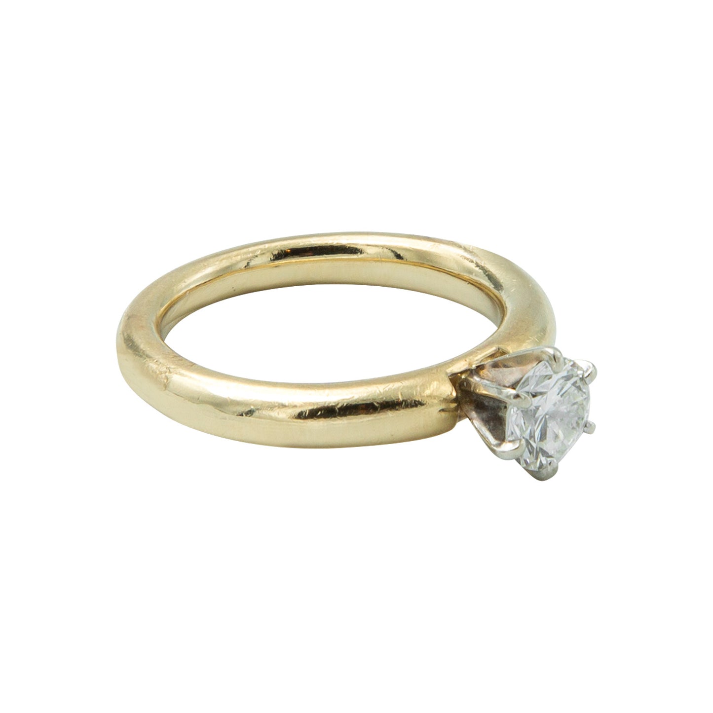 Anillo solitario en oro amarillo 14k con diamante