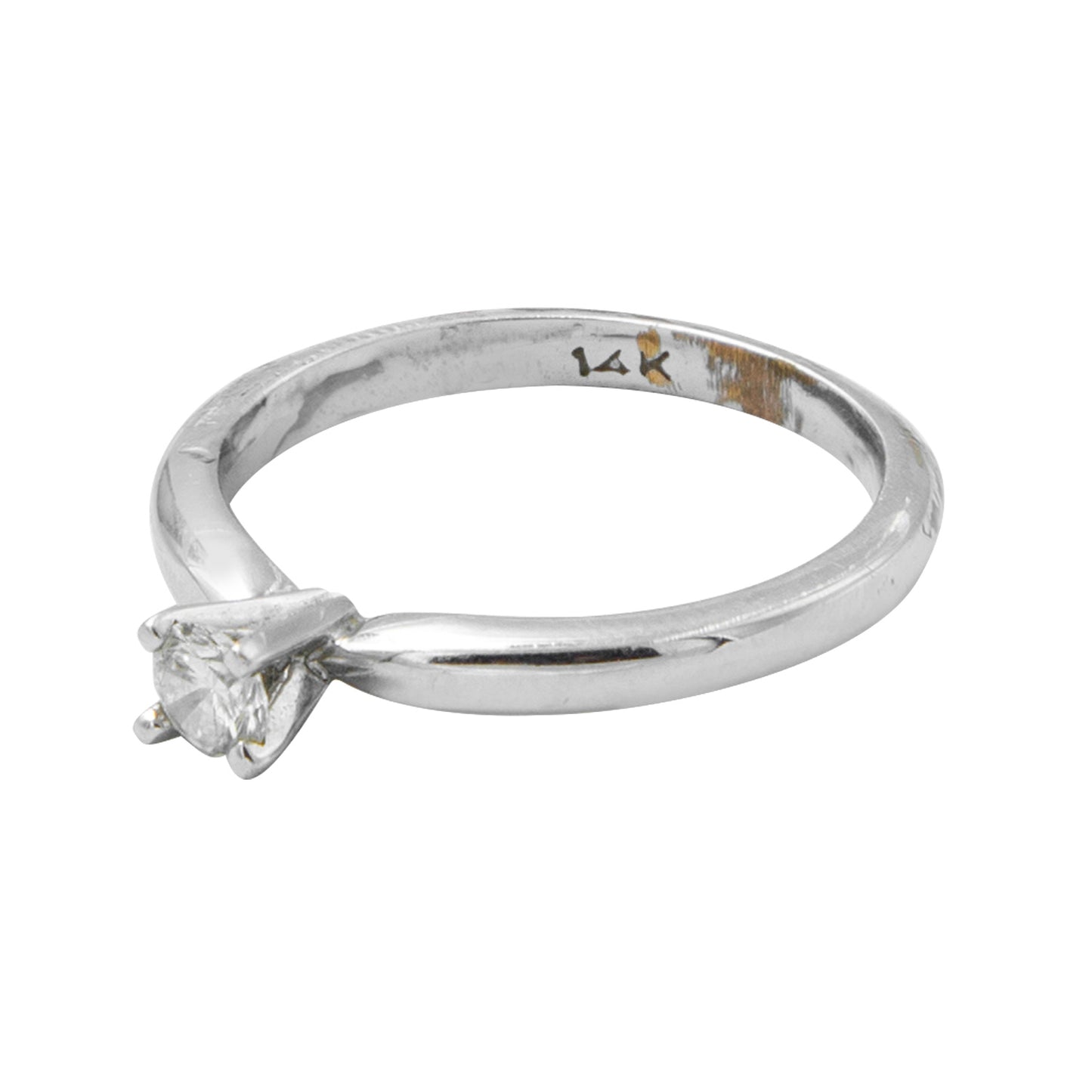 Anillo solitario en oro blanco de 14k con diamante de .25CT